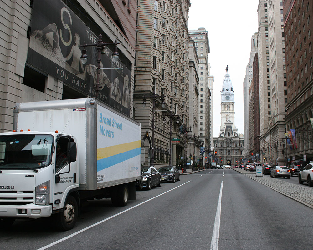 Broad Street Movers truck traversing the iconic Benjamin Franklin Parkway in Philadelphia