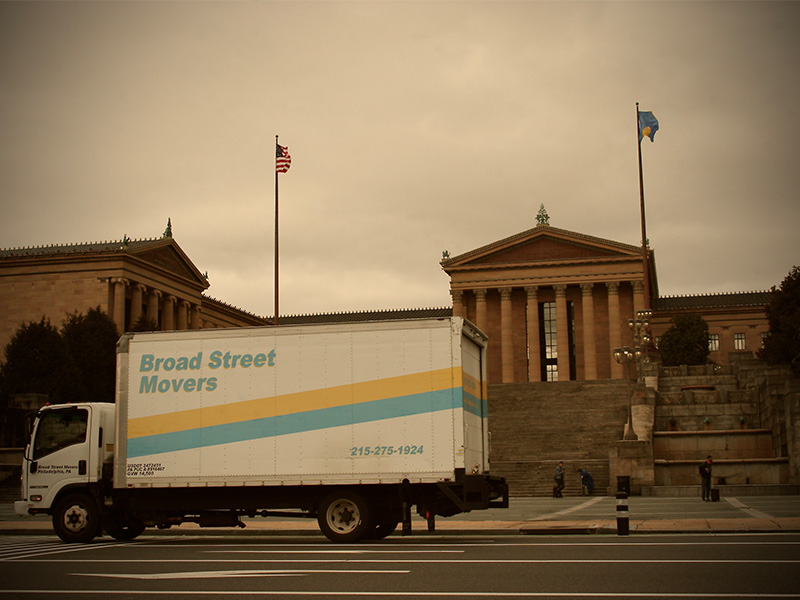Broad Street Movers truck parked in front of the historic Philadelphia Art Museum steps, highlighting our love and dedication to the city