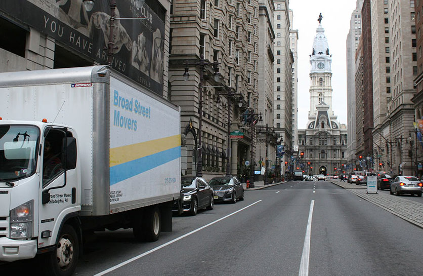 Broad Street Movers truck on Broad Street traveling to a residential Philadelphia home for a local move.