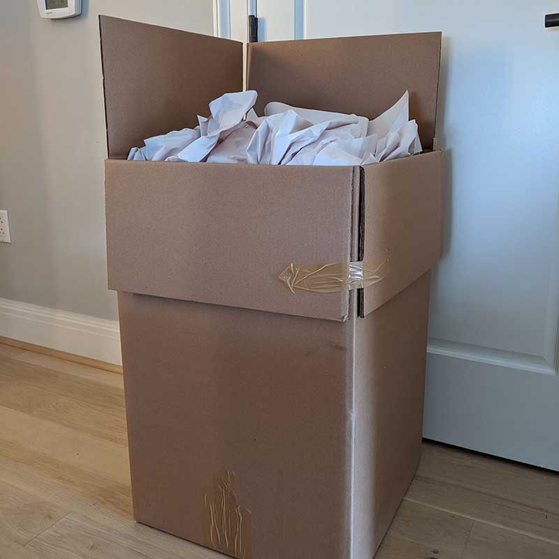 A box filled with junk that a valued Broad Street Movers customer requested be disposed.
