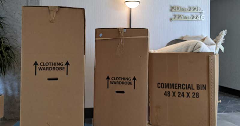 Boxes full of junk being removed from a Philadelphia move, and prepared for convenient disposal.